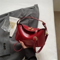 Elegant wine red leather square handbag with gold rotating lock and adjustable strap - Red