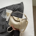 Elegant cream white faux leather crossbody handbag with a golden twist-lock closure - Off White