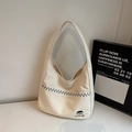 Minimalist beige canvas hobo bag with blue wave stitching and cute girl patch embroidery - Off White