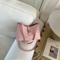 Pink lychee grain leather bucket bag with silver metal clasp and thin shoulder strap - Pink Without Pendant