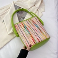Pink striped knit bucket bag with green leather handle and vibrant vertical lines - Green