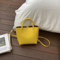 Bright yellow bucket bag in synthetic leather with dual handles and long strap - Yellow Without Pendant