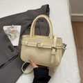 Elegant cream yellow crossbody bag with strap and decorative belt detail on soft fabric - Yellow Without Pendant