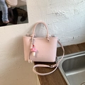 Pink faux leather handbag with MUTING embossing and a cute mushroom plush charm - With Charm / Pink