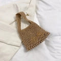 Handwoven tan mini tote bag with hollow mesh design and integrated handle detail - Khaki