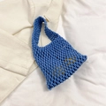 Blue hollow woven tote bag with a single handle for beach and summer travel fashion - Blue