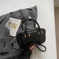 Elegant black leather handbag with ROSY DODENIA logo and detachable shoulder strap - Black