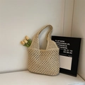 Chic beige straw tote bag with intricate crochet texture and interior lining for beach vacations - Off White