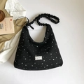 Chic black canvas tote bag with white star patterns and ruffled shoulder strap - Black