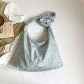 Light blue canvas tote bag with silver star patterns and Yes Honey bow detail - Blue