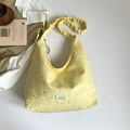 Chic light yellow tote bag with silver star prints and stylish ruched shoulder strap - Yellow
