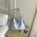 Light blue large hobo shoulder bag in soft leather with tassel and zipper detail - Blue Without Charm