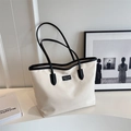 Bolso tote beige minimalista con ribete negro y etiqueta de moda de Nueva York - Beige y Negro