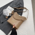 Khaki bucket shoulder bag with woven handle and cute rabbit pendant on grey suit - With Pendant / Khaki
