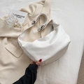 Quilted off-white oversized tote bag with wide shoulder strap and metal buckle detail - White