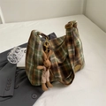 Green and brown plaid wool shoulder bag featuring a cute plush bunny charm and metal logo - Green With Pendant
