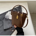 Retro dark brown leather bucket bag with gold buckle and adjustable shoulder strap - Brown