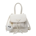 Minimalist beige leather mini backpack for women featuring a triangular metal logo plaque - With Pendant / Off-white