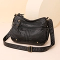 Classic black washed leather crossbody bag with multiple zippers and retro gold hardware - Black