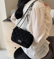Classic black quilted crossbody bag with silver chain strap and metal ball adjuster - Black