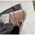 Pink quilted crossbody bag with diamond stitching and adjustable silver chain strap - Pink