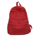 Minimalist red canvas backpack featuring large capacity storage and a front zipper pocket - Red