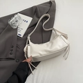 Retro cream faux leather underarm bag with side pockets and stylish tassels - Off White