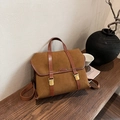 Brown vintage suede handbag with dark leather trim and metallic buckle closure - Brown