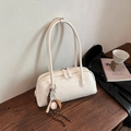 Vintage white faux leather baguette bag with baseball charms and long slim handles - With Charm / Off White