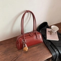 Vintage reddish brown baguette bag with white contrast stitching and baseball charm - With Charm / Red