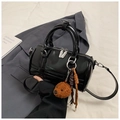 Glossy black bowling bag with top handles and a cute brown teddy bear plush charm - Black With Bear Charm