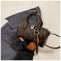 Brown bowling crossbody bag in glossy PU leather with plush charm and woven strap - Coffee With Bear Charm
