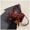 Minimalist wine red PU leather bowling bag with a cute puppy keychain and silver hardware - Wine Red With Bear Charm