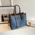Blue denim and brown leather tote bag with top handles and adjustable shoulder strap - Dark Blue