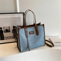 Light blue contrast tote bag with brown leather handles and a detachable shoulder strap - Light Blue