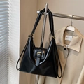 Minimalist black faux leather tote bag with gold hardware and stylish belt buckle detail - No Pendant / Black