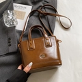 Borsa a secchiello in pelle cerata marrone con manici e tracolla regolabile per donna - Stile di base / Marrone