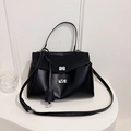 Elegant black leather handbag with silver metallic twist lock and adjustable shoulder strap - Matte Black Small