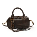 Deep brown vintage Boston handbag with metallic tennis racket charm and textured finish - With Pendant / Coffee
