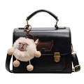 Sac à main noir en cuir avec écusson chien, breloque mouton et sangle dorée - Noir Avec Charme Soot Sprite