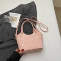 Pink chic bucket handbag in glossy leather with double handles and a gold crossbody strap - No Pendant / Pink