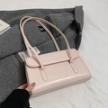 Elegante lichtroze onderarm enveloptas van oliewasleder voor dames met lange riem - Roze Zonder Hanger