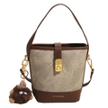 Canvas and leather bucket bag in khaki and dark brown with a cute plush monster charm - Dark Brown With Brown Charm
