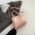 Elegante borsa a secchiello in pelle cerata rosa lucida con finiture in argento - Senza Ciondolo / Rosa Senza Pendente