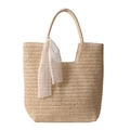 Schicke beige geflochtene Strohtasche mit weißer Spitzenschleife für den Sommerurlaub - Weiß