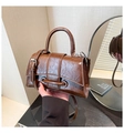 Detail view of brown vintage handbag showing textured oil wax leather and top handle - One Size / Brown