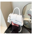 Detail shot of white PU leather texture with elegant silver buckle and ring hardware - One Size / White