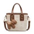 Sac seau beige chic avec gaufrage d'étoiles, garniture brune et breloque chiot - Blanc Cassé Avec Pendentif Chiot