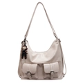 Minimalist beige oil wax leather hobo bag with front pockets and black charm - With Doll Pendant / White