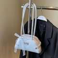 Lichtblauwe kunstlederen handtas met witte kanten strik en metalen merklogo plaatje - Blauw (Geen Hanger)